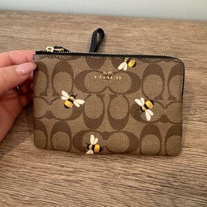 Coach Corner Zip Wristlet In Signature Canvas With Bee Print